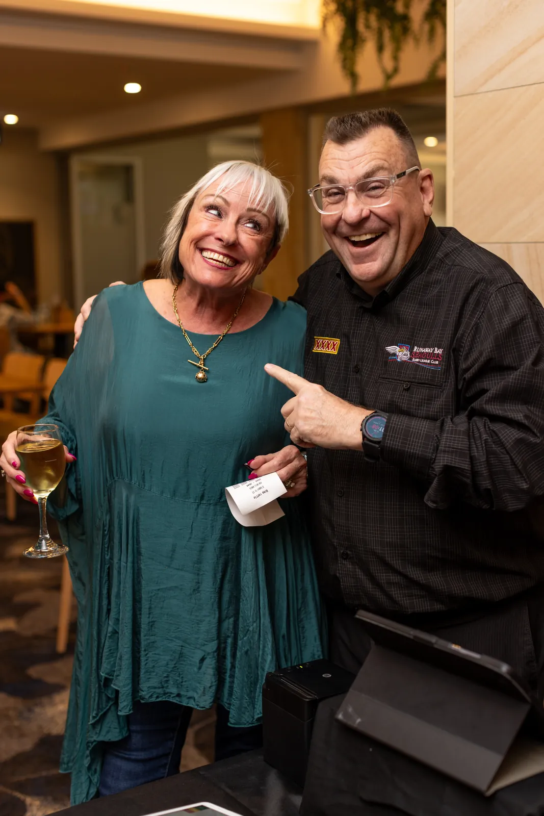 Members sharing a laugh in the lounge