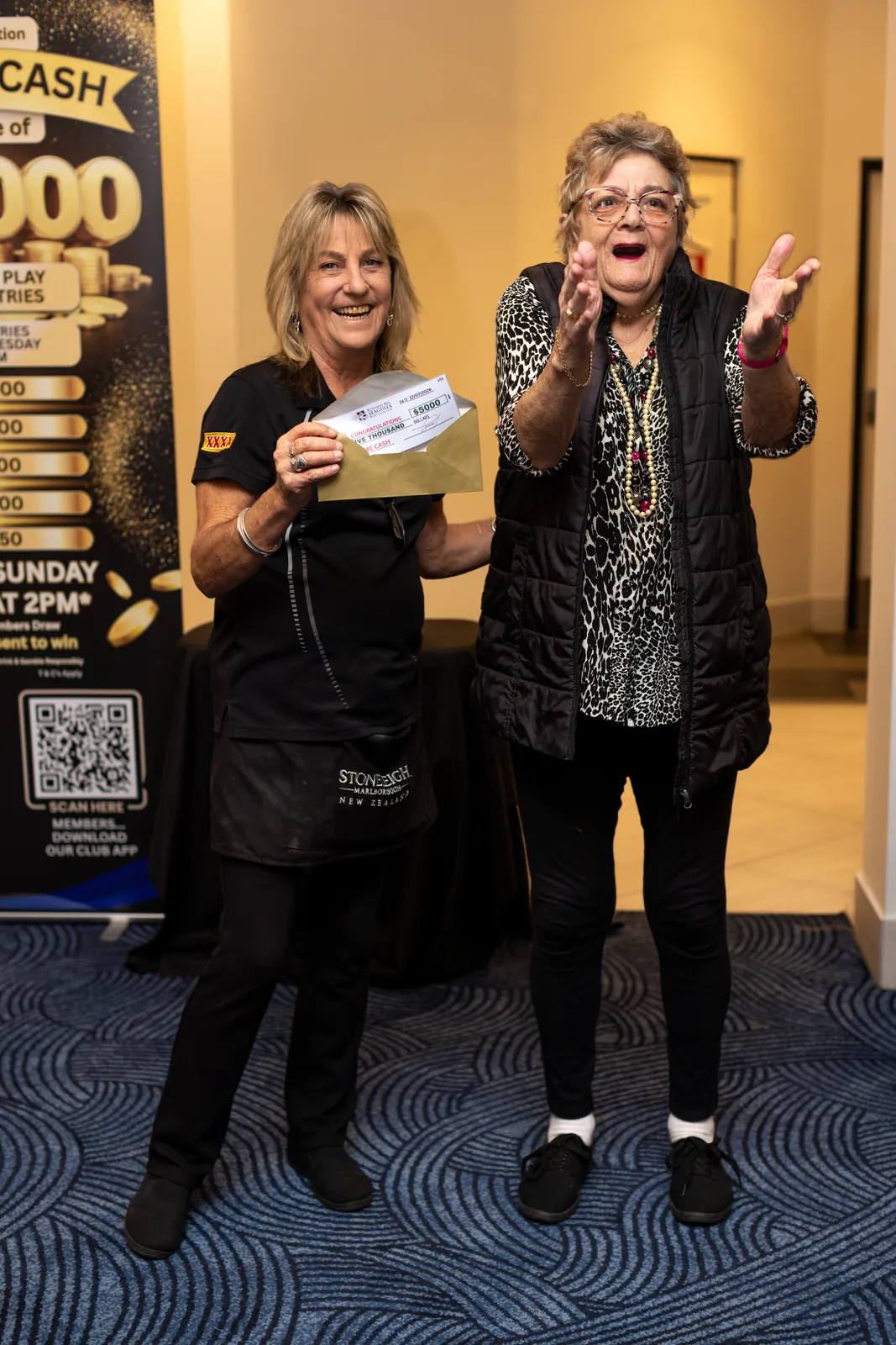 Presenting a $5,000 members promotion prize